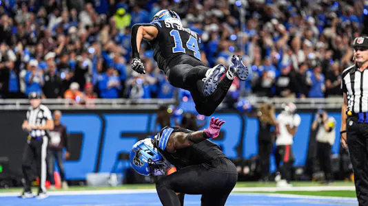 Jahmyr Gibbs celebrates a touchdown with wide receiver Amon-Ra St. Brown, with the Detroit Lions featured in my NFL Picks Against the Spread Week 9