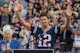 Former New England Patriots quarterback Tom Brady gestures as we look at our Tom Brady next team odds.
