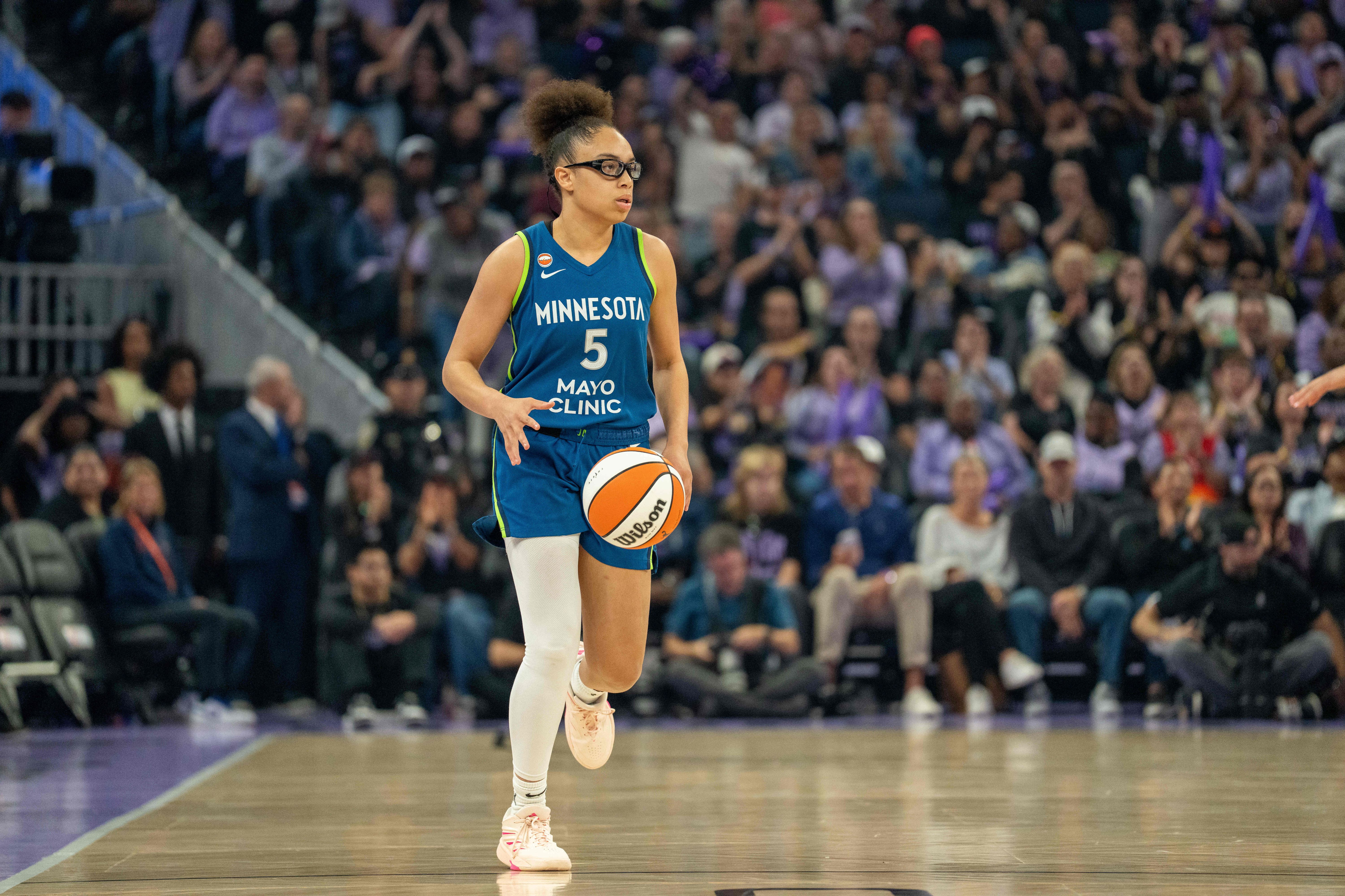Minnesota Lynx guard Olivia Miles brings the ball up court as I make my best Lynx vs. Mystics prediction