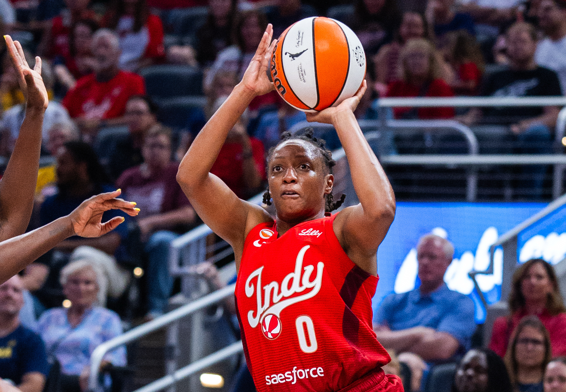 Kelsey Mitchell attempts a triple as part of our Lynx vs. Fever predictions!