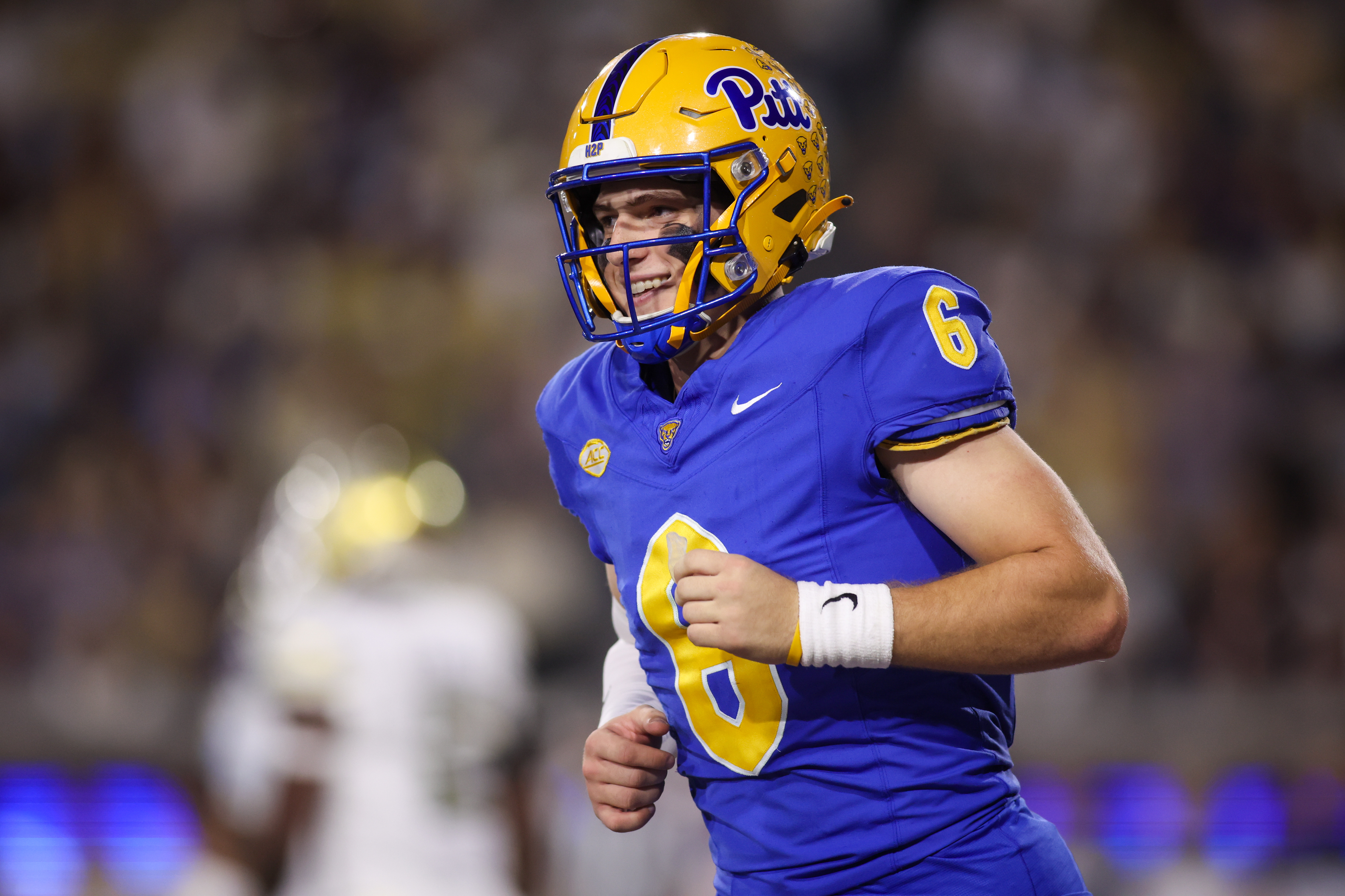 Pittsburgh quarterback Mason Heintschel (6) reacts after a touchdown as we offer our Pittsburgh vs. East Carolina predictions today for the Military Bowl.