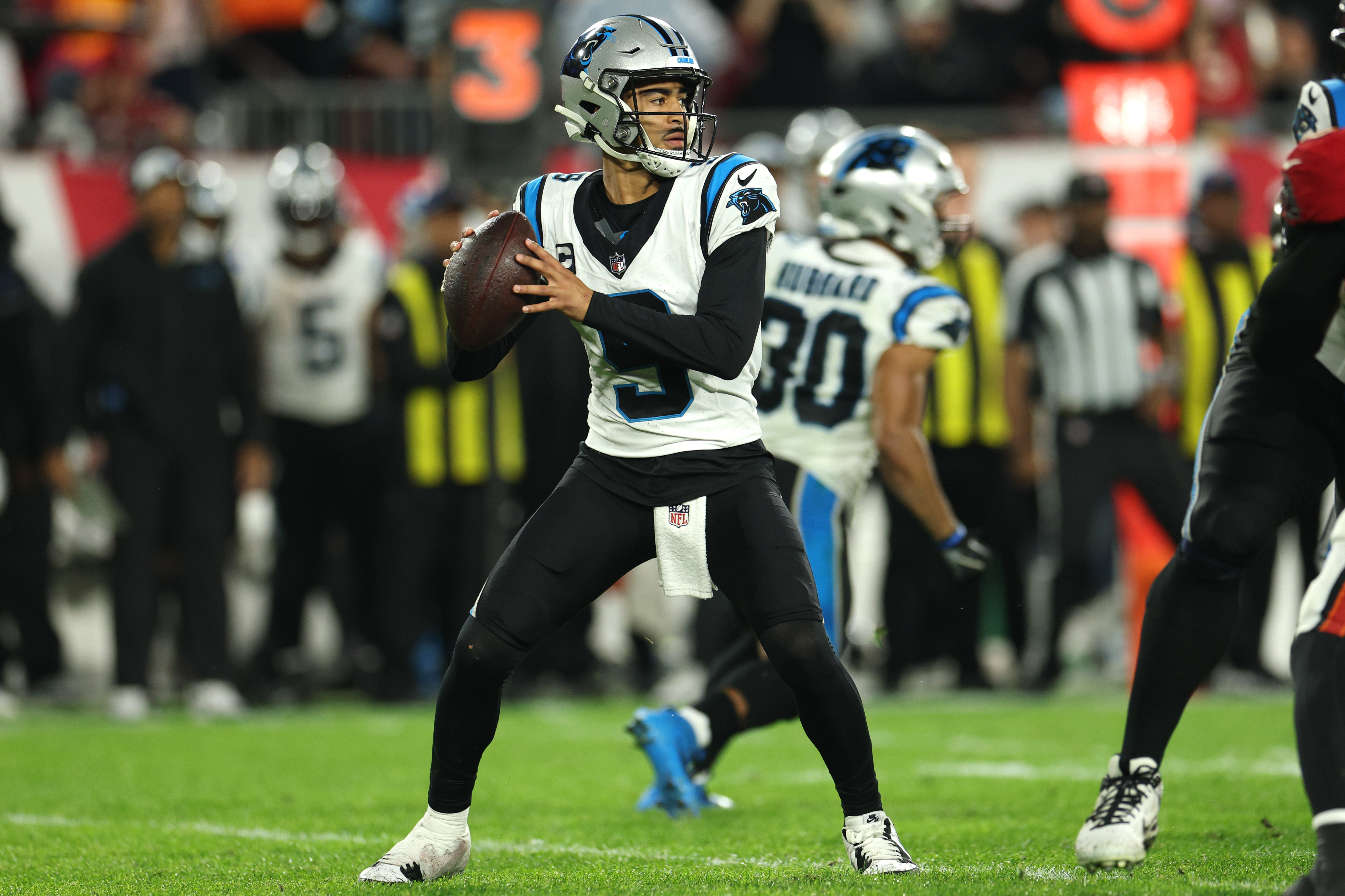 Carolina Panthers quarterback Bryce Young (9) passes as we break down our Rams vs. Panthers expert picks for Wild Card Weekend.