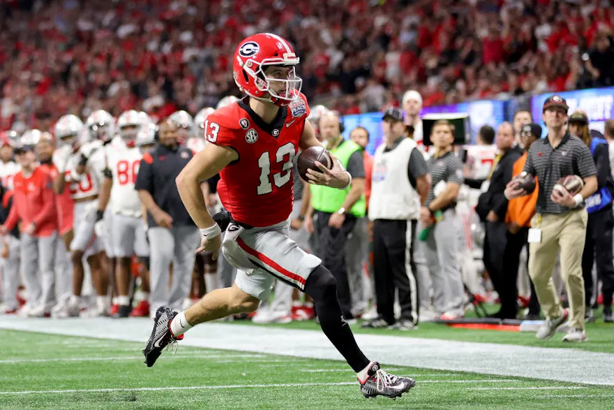 Stetson Bennett of the Georgia Bulldogs runs for a touchdown against the Ohio State Buckeyes.