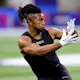 Bijan Robinson of Texas participates in a drill during the NFL Combine as we look at our Falcons betting preview for 2023.