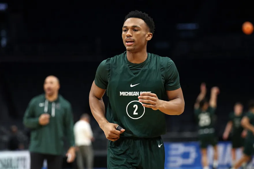 Tyson Walker of the Michigan State Spartans practices ahead of the NCAA Men's Basketball Tournament, and we offer our top Michigan State vs. Mississippi State prediction based on the best March Madness odds.