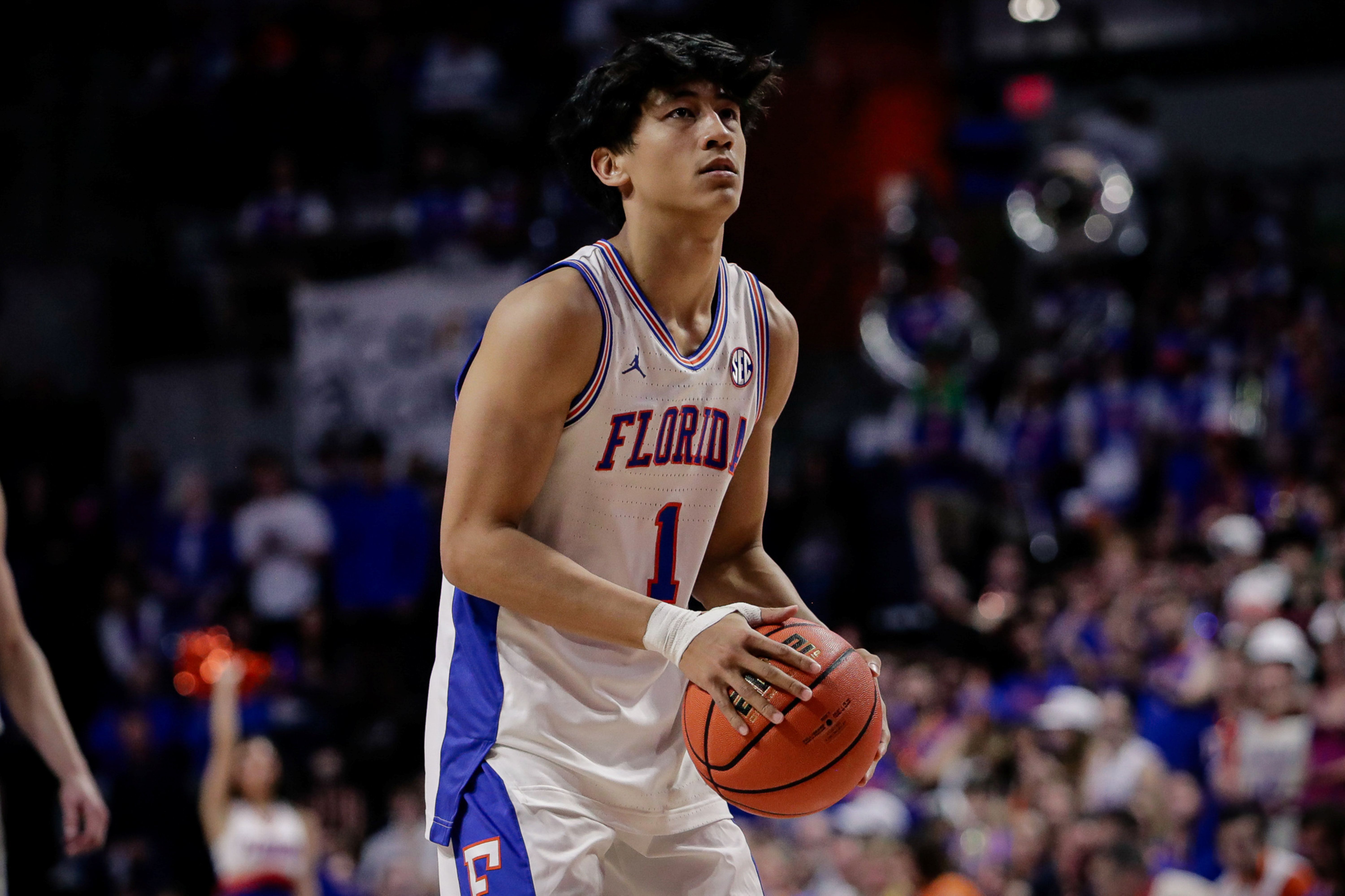 Florida Gators guard Xaivian Lee attempts a free throw, and he's featured as part of our Florida vs. Kentucky predictions.