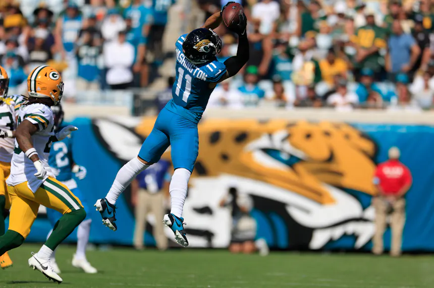 Jacksonville Jaguars wide receiver Parker Washington (11) hauls in a reception as we look at our anytime touchdown scorer predictions for Week 9.