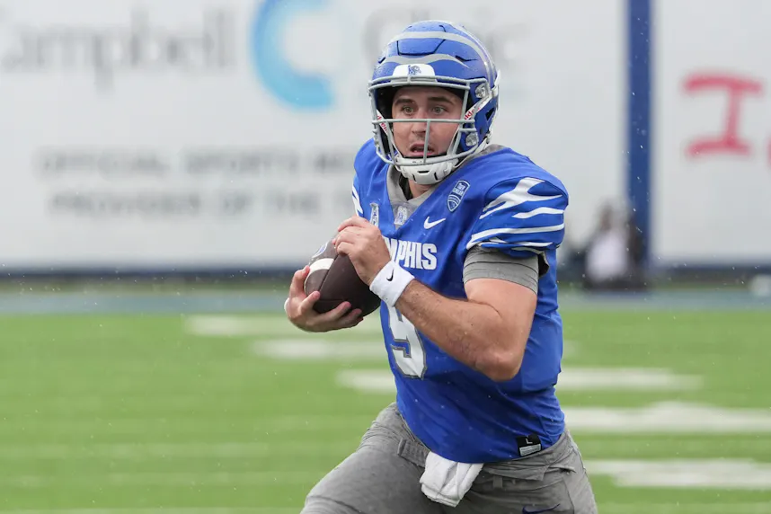 Memphis' Seth Henigan (9) runs with the ball as we offer our Rice vs. Memphi prediction tonight.