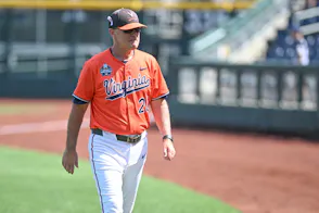 Virginia Cavalier head coach Brian O'Connor walks off the field as we look at the sports betting financials for Virginia in June 2024.