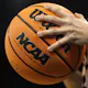 The NCAA logo is seen on the game ball as we look at a potential nationwide ban on college player prop betting.