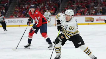 Brad Marchand #63 of the Boston Bruins skates against the Washington Capitals as we look at the best prop pick and predictions for Game 1 of the Eastern Conference opening round series between the Maple Leafs and Bruins. 