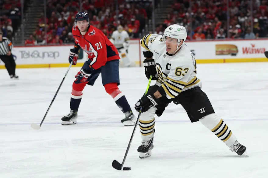 Brad Marchand #63 of the Boston Bruins skates against the Washington Capitals as we look at the best prop pick and predictions for Game 1 of the Eastern Conference opening round series between the Maple Leafs and Bruins. 