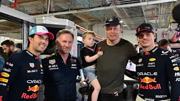 Elon Musk, founder and CEO of SpaceX and Tesla, with his son X Æ A-12 in the Red Bull Racing paddock as we look at our Zuckerberg-Musk fight odds.
