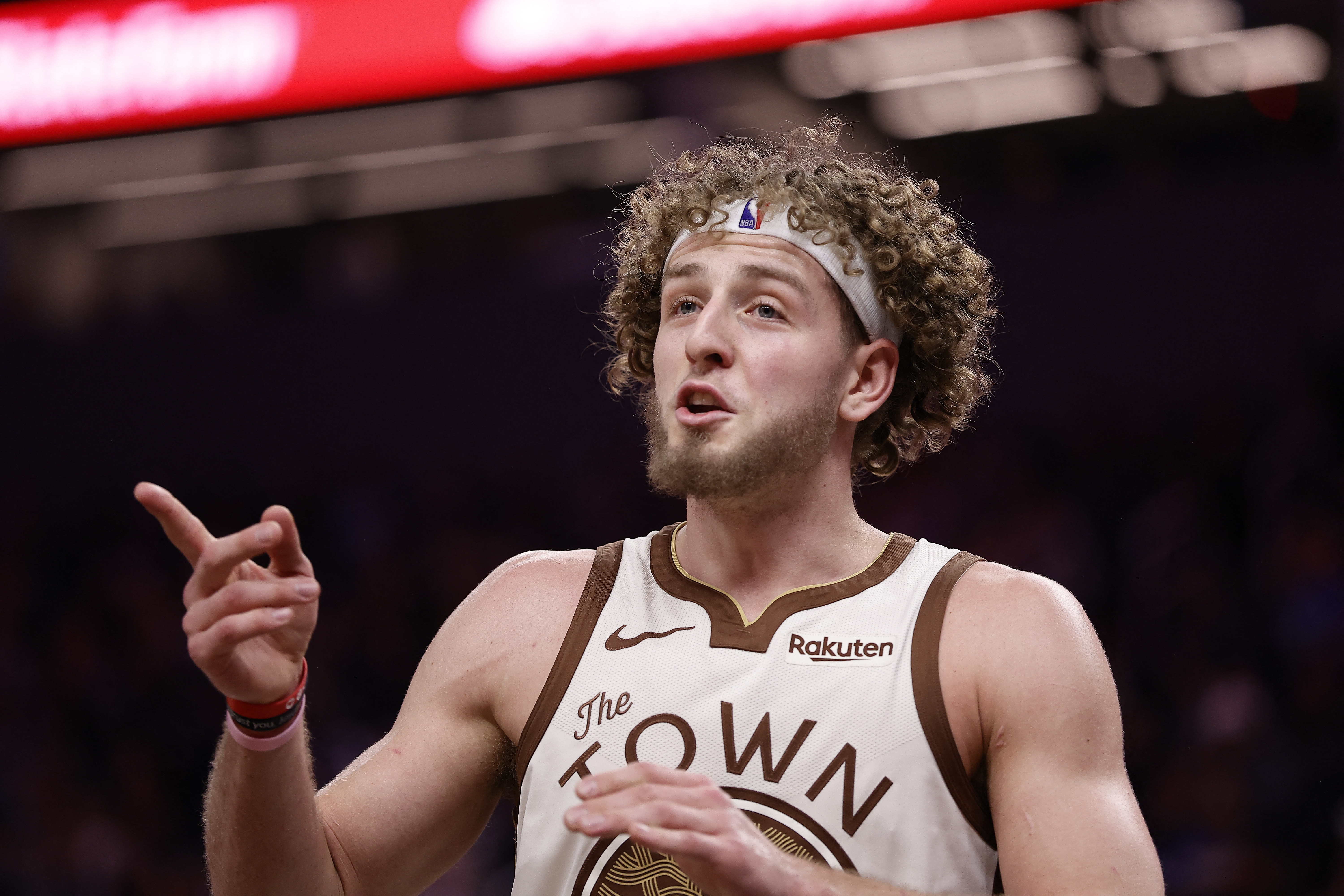 Golden State Warriors guard Brandin Podziemski (2), seen here speaking to a referee, is featured in our Spurs vs. Warriors player props today.