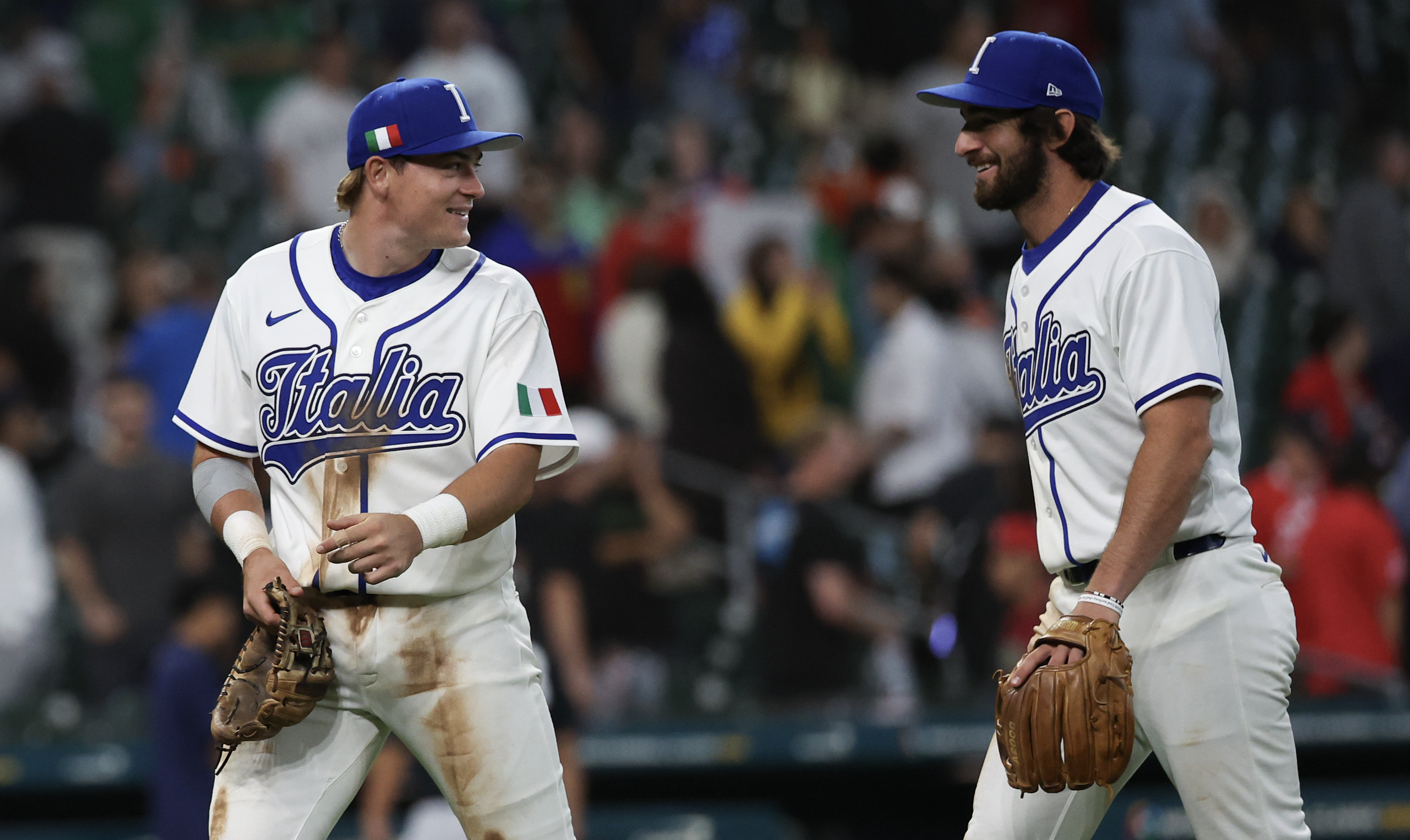 Italy's Andrew Fischer and Michael Lorenzen celebrate as we make our best Italy vs. Venezuela prediction
