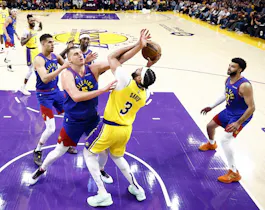 Anthony Davis of the Los Angeles Lakers takes a shot against Nikola Jokic of the Denver Nuggets in the first quarter during Game 3 of the Western Conference playoffs. We're backing Jokic in our Lakers vs. Nuggets player props. 