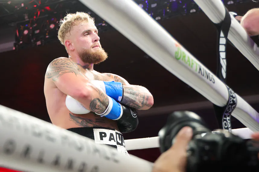 Jake Paul reacts after knocking out Andre August as we look at the Jake Paul vs. Mike Tyson expert picks.