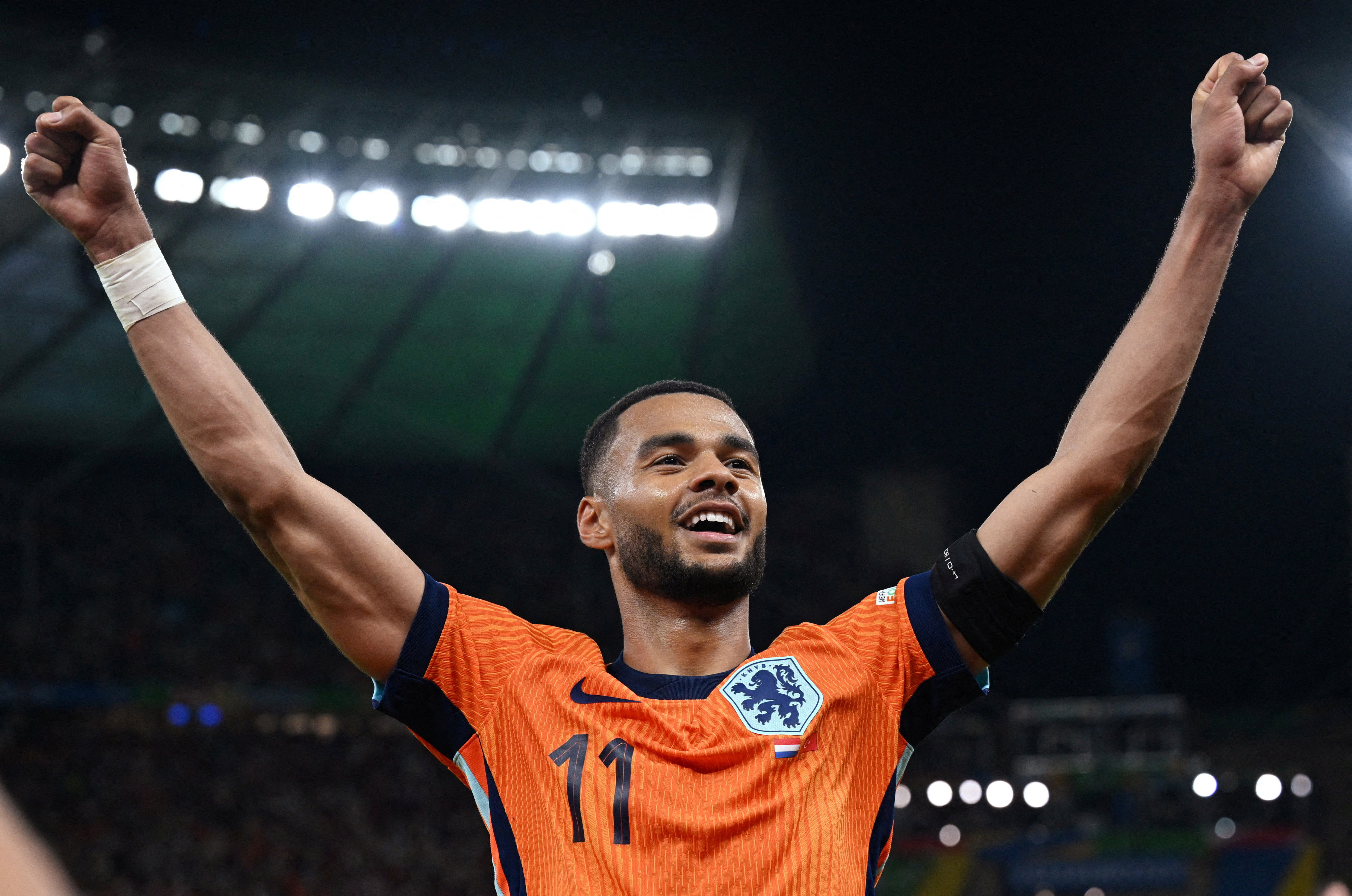 Netherlands' Cody Gakpo celebrates as we make our best Netherlands vs. Japan prediction. 