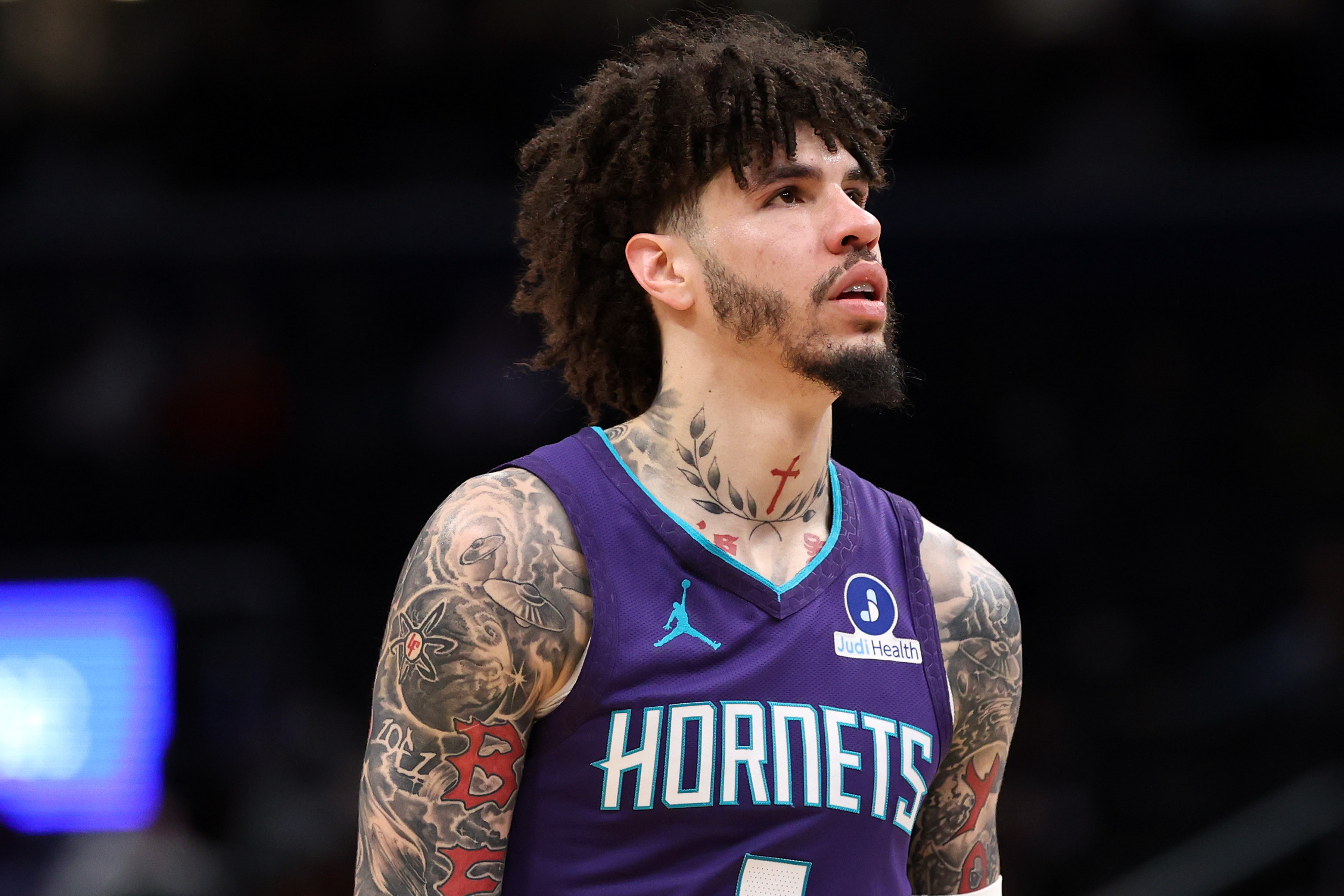 Charlotte Hornets guard LaMelo Ball (1), seen here looking on during a game, is featured in our Hornets vs. Magic player props tonight.