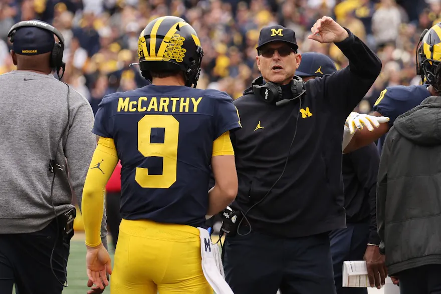 J.J. McCarthy of the Michigan Wolverines celebrates as we look at the top Washington vs. Michigan odds for the 2024 national championship game.