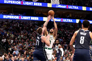 Jayson Tatum (0) of the Boston Celtics shoots the ball against Luka Doncic (77) of the Dallas Mavericks, as we offer our NBA Finals MVP predictions and power rankings to win the award ahead of the 2024 NBA Finals.