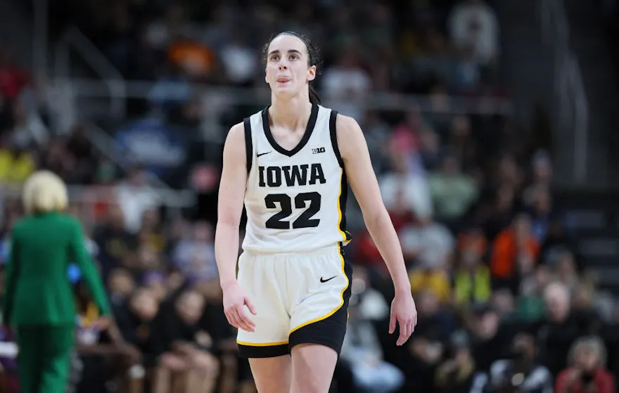 Caitlin Clark #22 of the Iowa Hawkeyes looks on as we offer our best Caitlin Clark player props and predictions for UConn vs. Iowa in the women's Final Four on Friday.