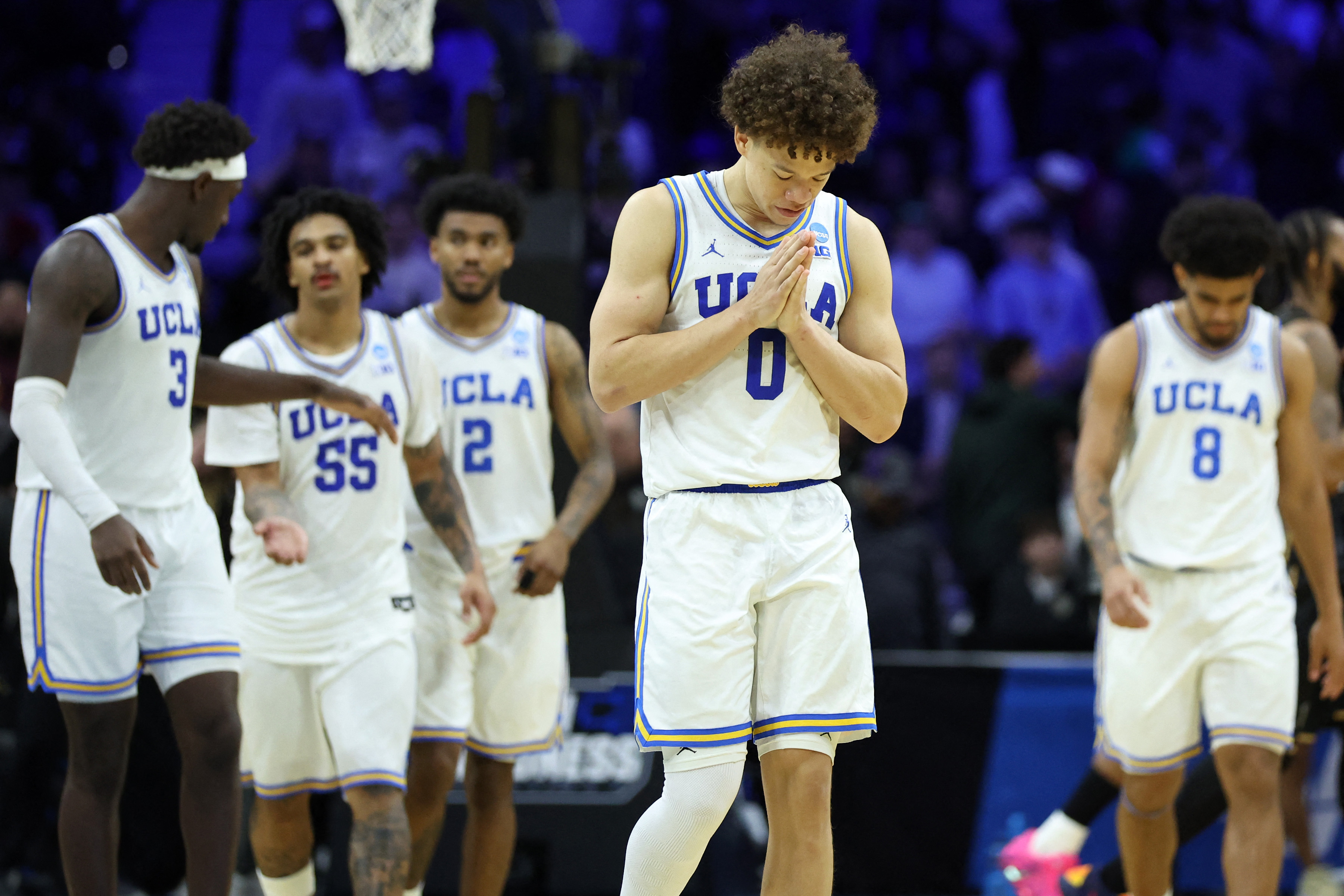 UCLA guard Trent Perry (0) reacts after a win
