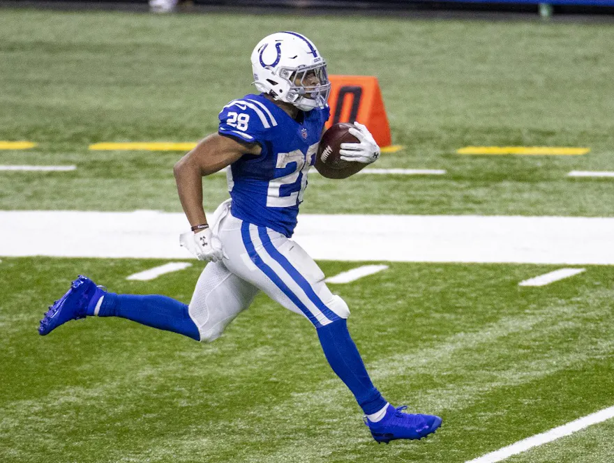 Jonathan Taylor of the Indianapolis Colts runs for a touchdown during the fourth quarter of the game against the Jacksonville Jaguars at Lucas Oil Stadium on January 3, 2021 in Indianapolis, Indiana.