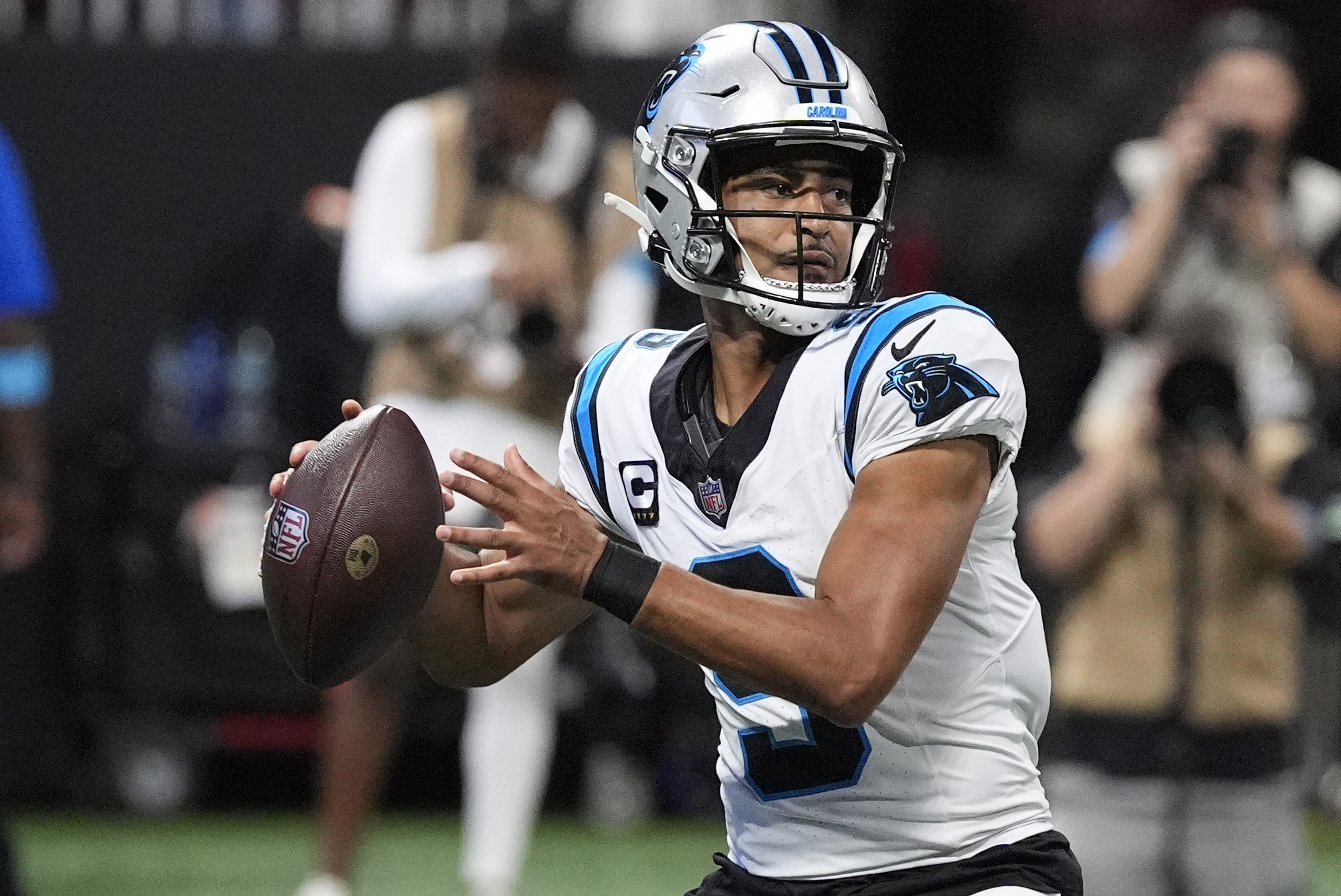 Panthers quarterback Bryce Young (9) looks to pass as we break down our Lions vs. Panthers expert picks.