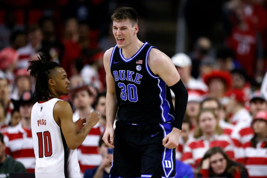 Kyle Filipowski #30 of the Duke Blue Devils reacts following a basket during the second half of the game against the NC State Wolfpack as we make our NC State vs. Duke prediction and pick for the ACC Tournament quarterfinals on Thursday.