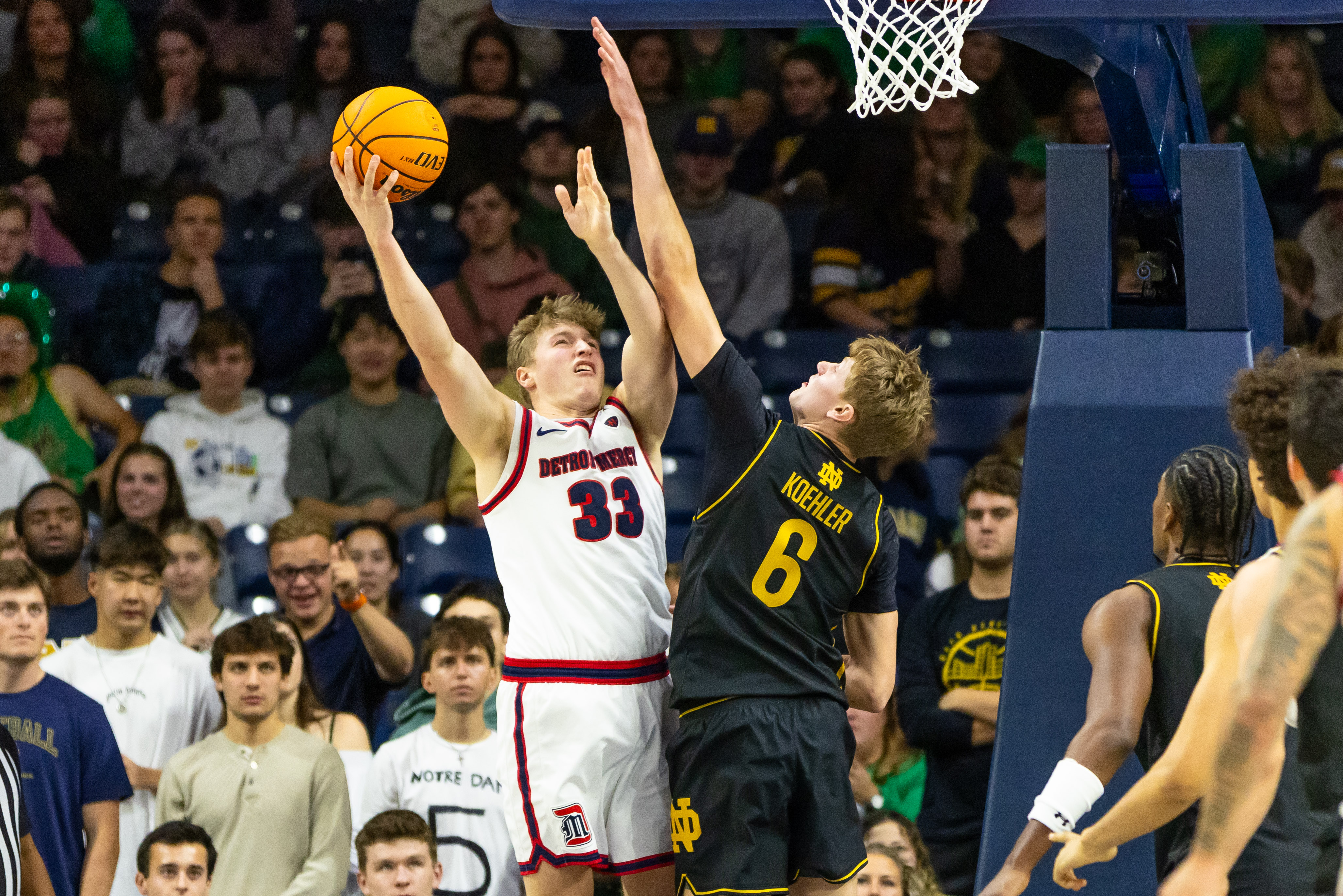 Detroit Mercy Titans guard TJ Nadeau (33), seen here shooting during a game, is featured in our Detroit Mercy vs. Wright State prediction today.