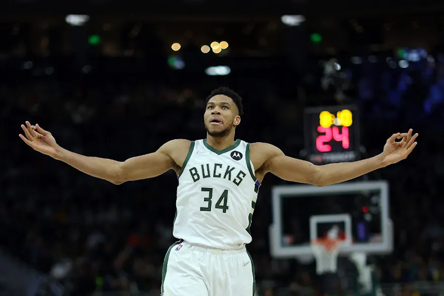 Giannis Antetokounmpo of the Milwaukee Bucks reacts to a 3-point point shot during the second half of a game against the Golden State Warriors at Fiserv Forum in Milwaukee, Wisconsin. Photo by Stacy Revere/Getty Images via AFP.