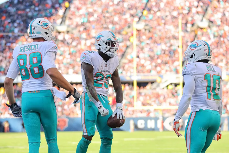 Jeff Wilson Jr. of the Miami Dolphins celebrates scoring a touchdown against the Chicago Bears.
