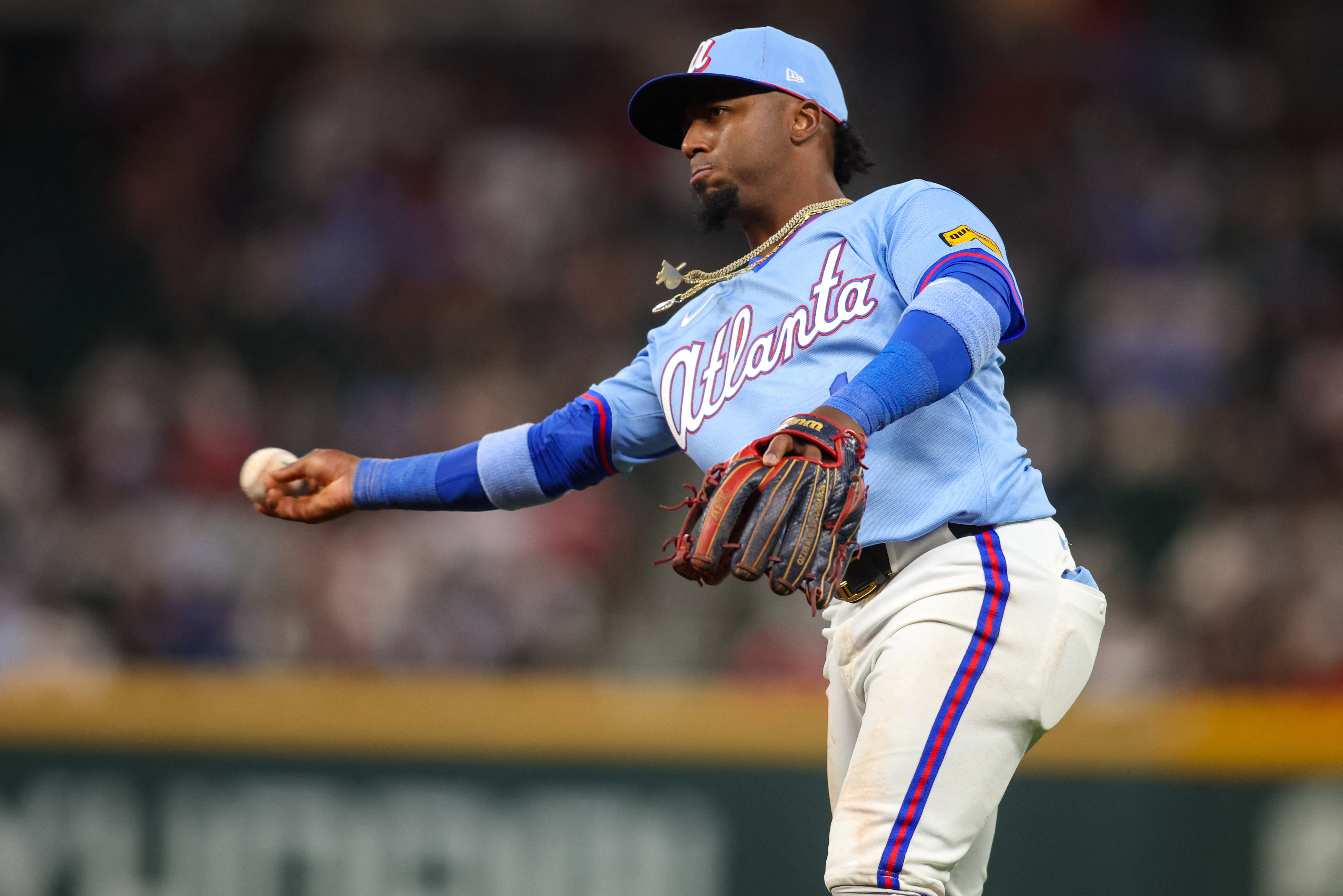 Atlanta Braves second baseman Ozzie Albies throws a runner out as we make our best Guardians vs. Braves prediction.