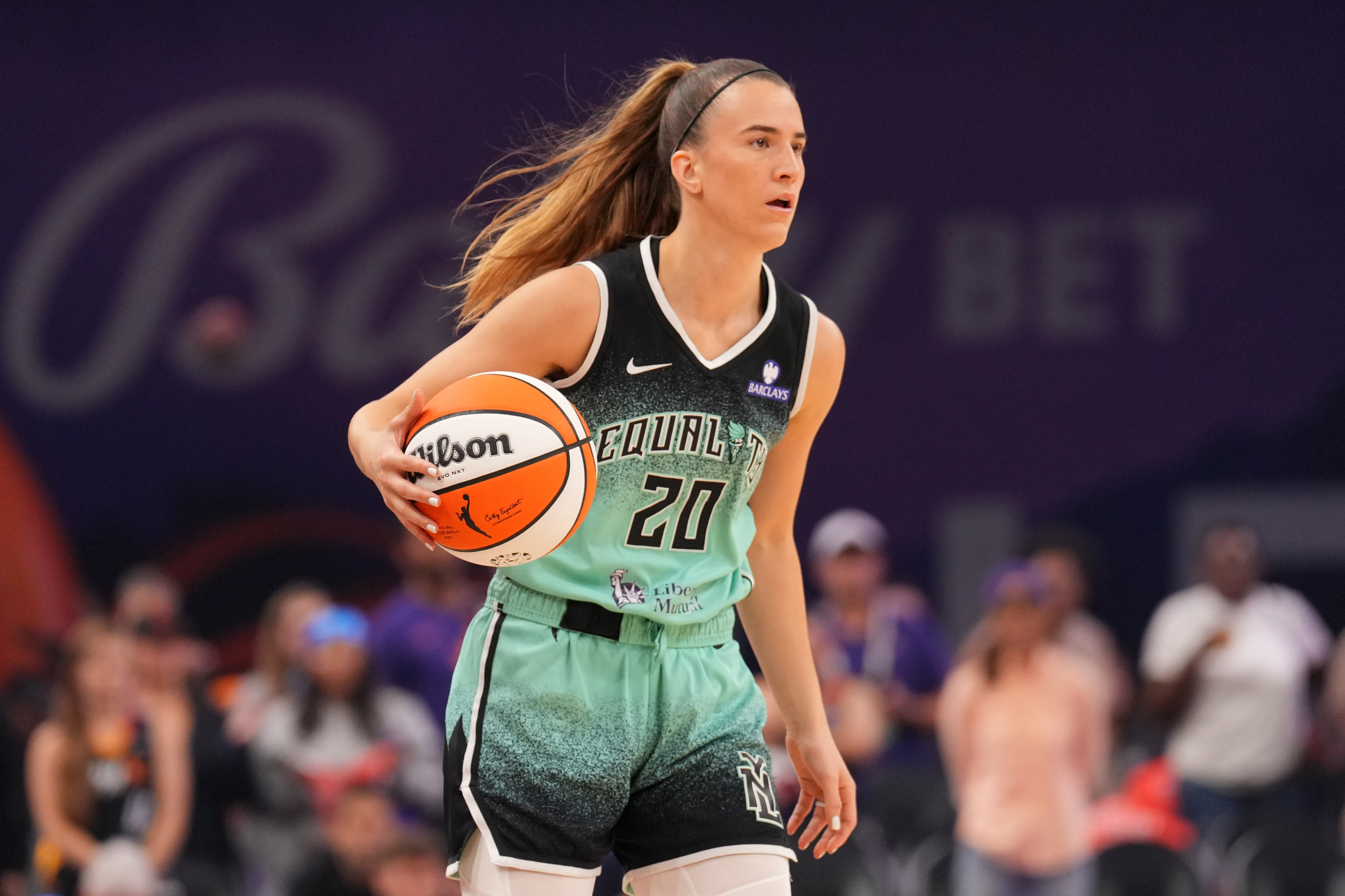 New York Liberty guard Sabrina Ionescu dribbles as we make our best Mercury vs. Liberty prediction.