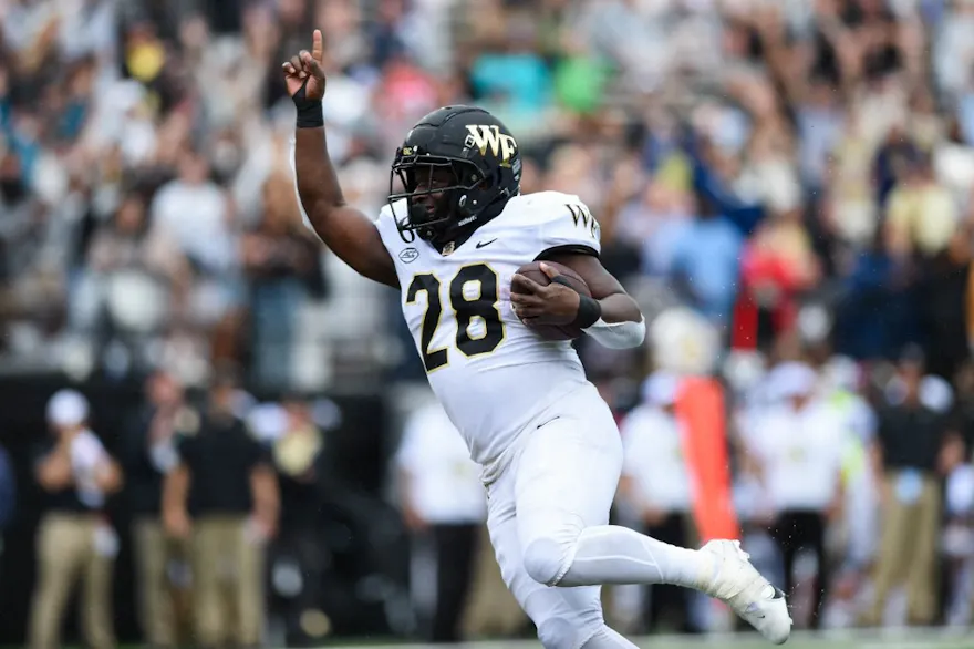 Quinton Cooley #28 of the Wake Forest Deacons runs into the end zone against the Vanderbilt Commodores in the fourth quarter at Vanderbilt Stadium on September 10, 2022 in Nashville, Tennessee.