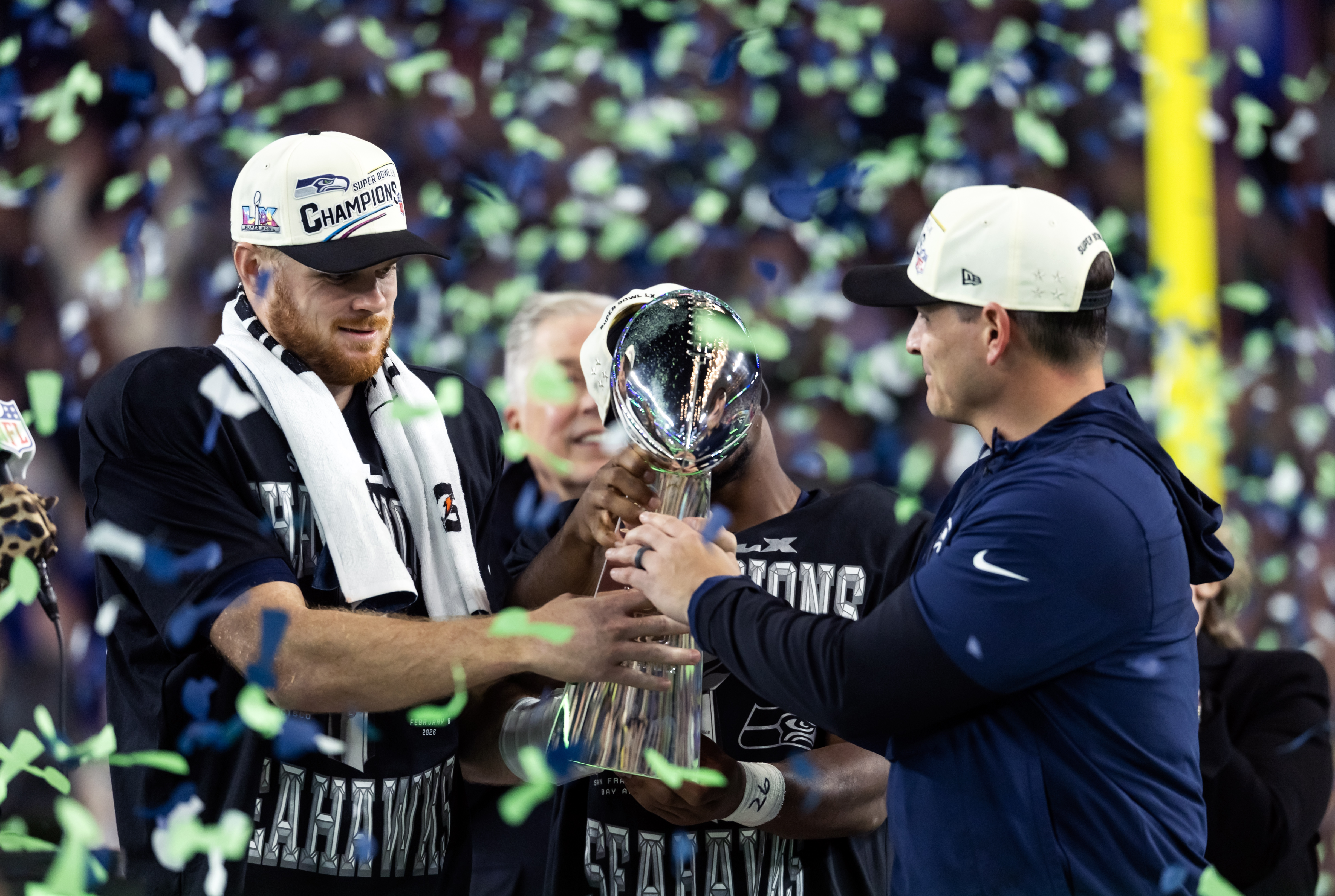 Sam Darnold and Mike Macdonald hoist the Lombardi Trophy after winning the Super Bowl, as we look at who will buy the Seahawks.