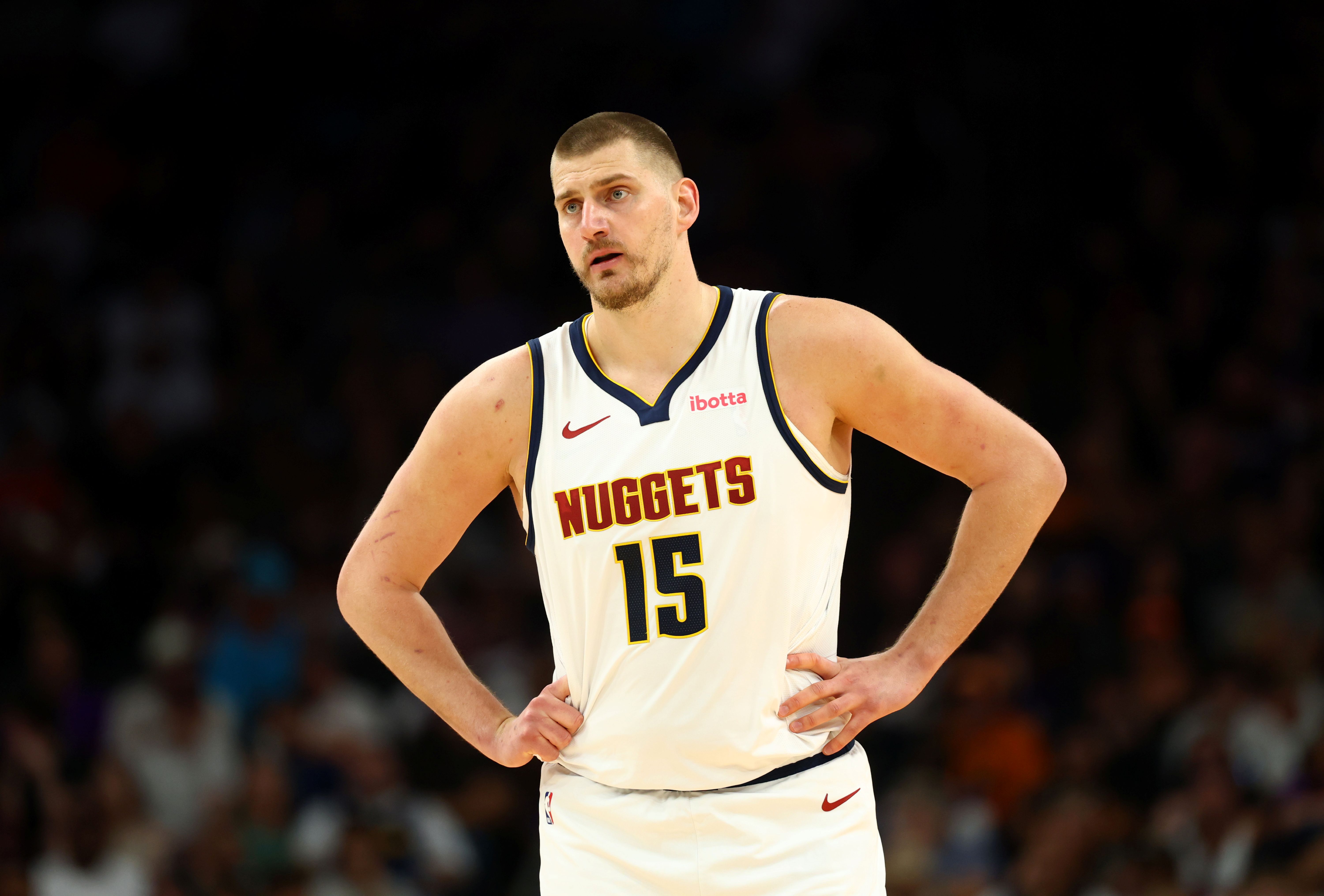 Denver Nuggets center Nikola Jokic in action, and he's key as we look at our Warriors vs. Nuggets player props.