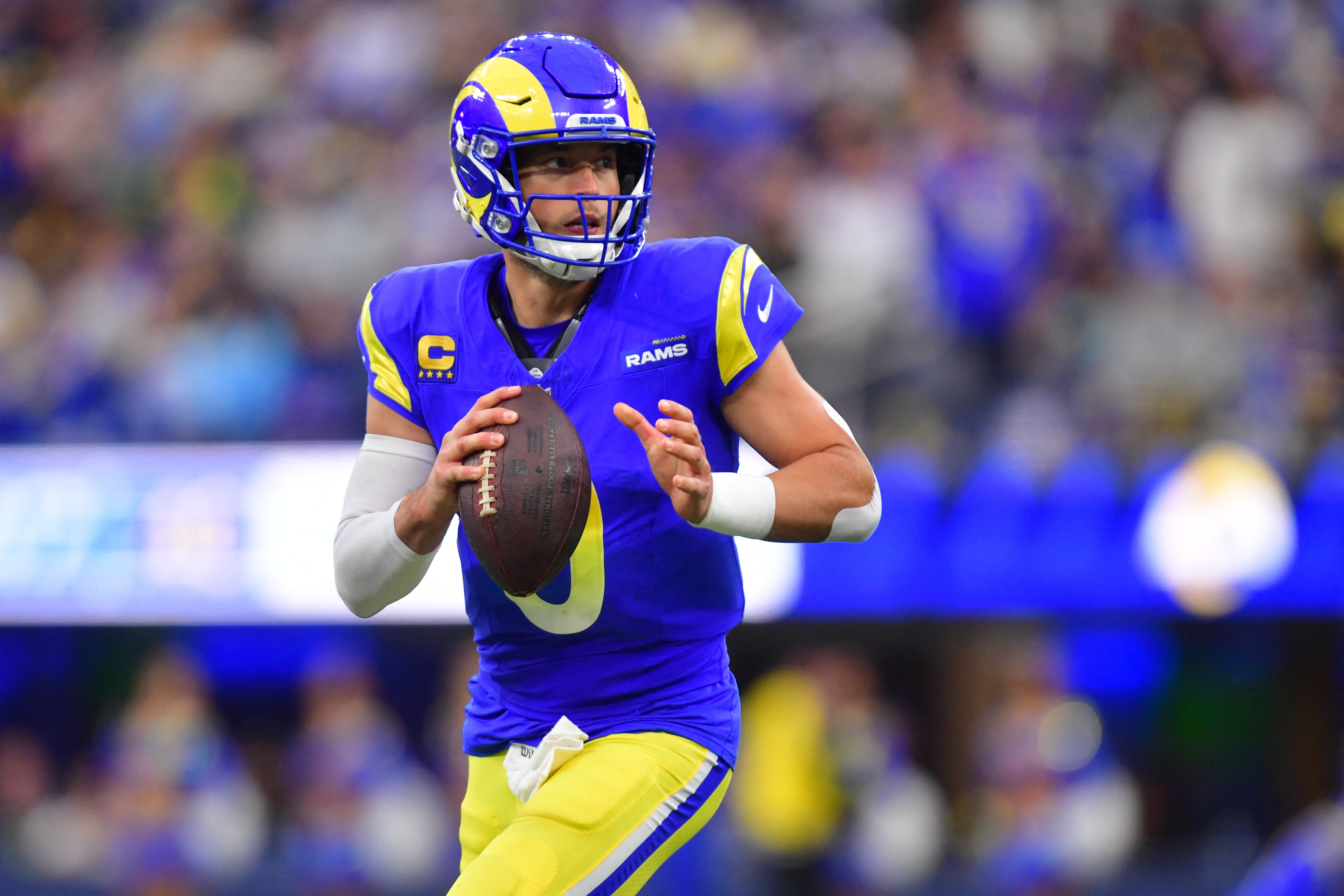 Los Angeles Rams quarterback Matthew Stafford (9) looks downfield as we offer our best Matthew Stafford player prop picks.