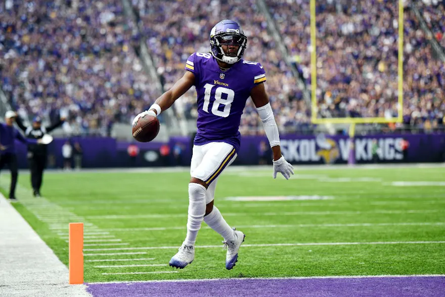 Justin Jefferson of the Minnesota Vikings scores a touchdown during the first quarter against the Green Bay Packers, and we offer our top predictions for Vikings vs. Panthers based on the best NFL odds.