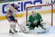 Connor McDavid plays the puck in front of Jake Oettinger during the second period in Game 5 as Gary Pearson offers his best props and predictions for Sunday's Game 6 of the Western Final between the Oilers and Stars. 