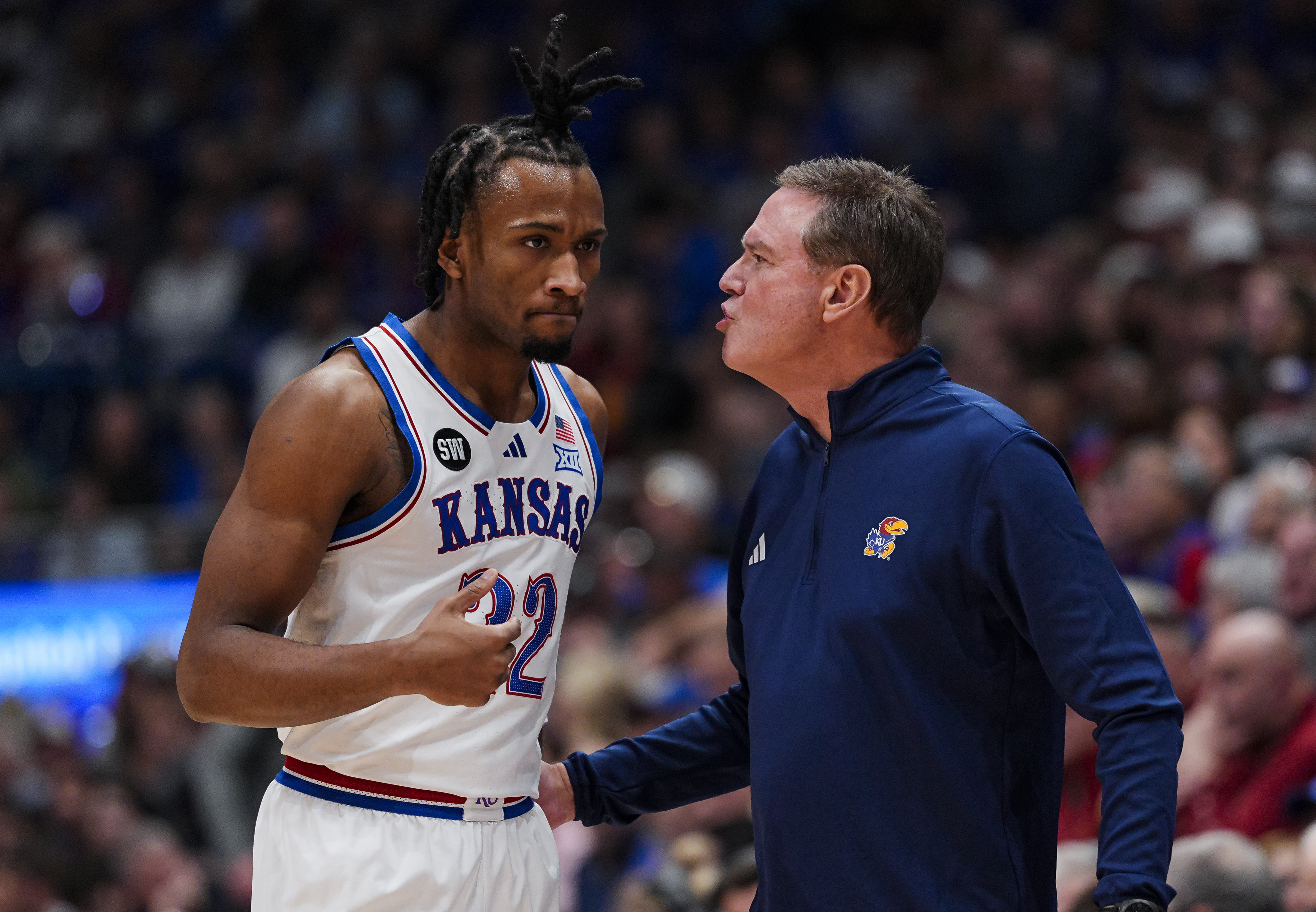 Kansas Jayhawks guard Darryn Peterson (22) talks to head coach Bill Self as we dive into our Kansas vs. Colorado prediction today.