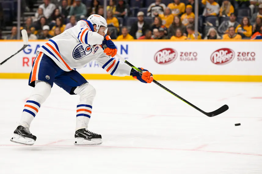 Edmonton Oilers center Leon Draisaitl shoots and scores on Nashville Predators goaltender Juuse Saros as we offer our Oilers vs. Flames prediction.