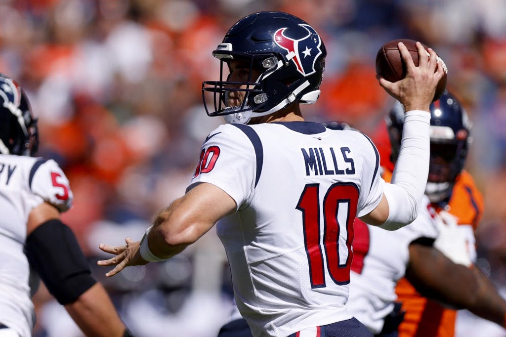 Davis Mills #10 of the Houston Texans throws a pass against the Denver Broncos during the first quarter at Empower Field At Mile High on Sept. 18 in Denver, Colorado. Justin Edmonds/Getty Images/AFP