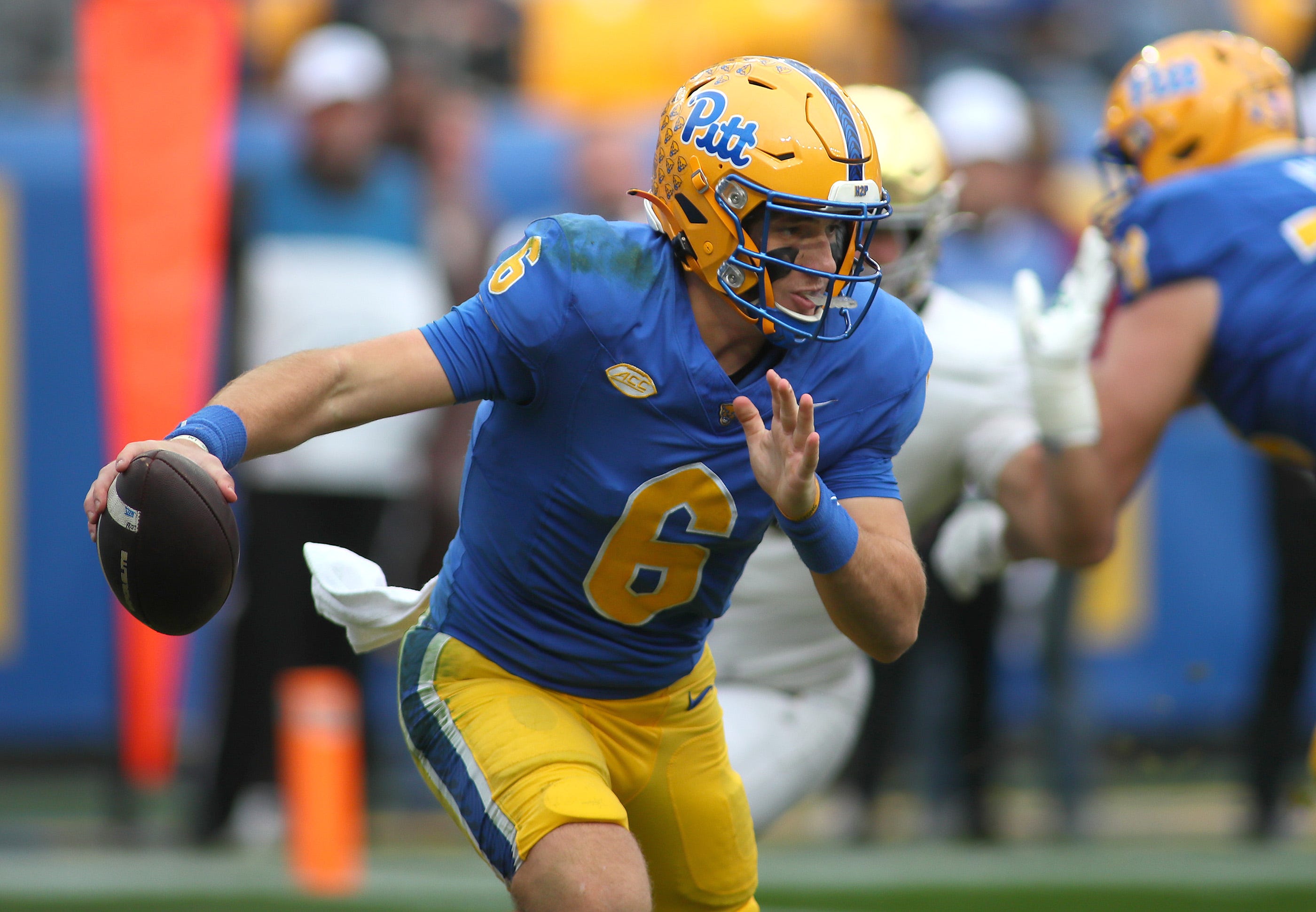 Pittsburgh Panthers quarterback Mason Heintschel (6) scrambles out of the pocket as we break down our Pittsburgh vs. East Carolina predictions.