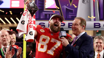 Travis Kelce of the Kansas City Chiefs reacts as he holds the Lombardi Trophy after defeating the San Francisco 49ers during Super Bowl LVIII at Allegiant Stadium as we look at our Chiefs Week 1 opponent odds.
