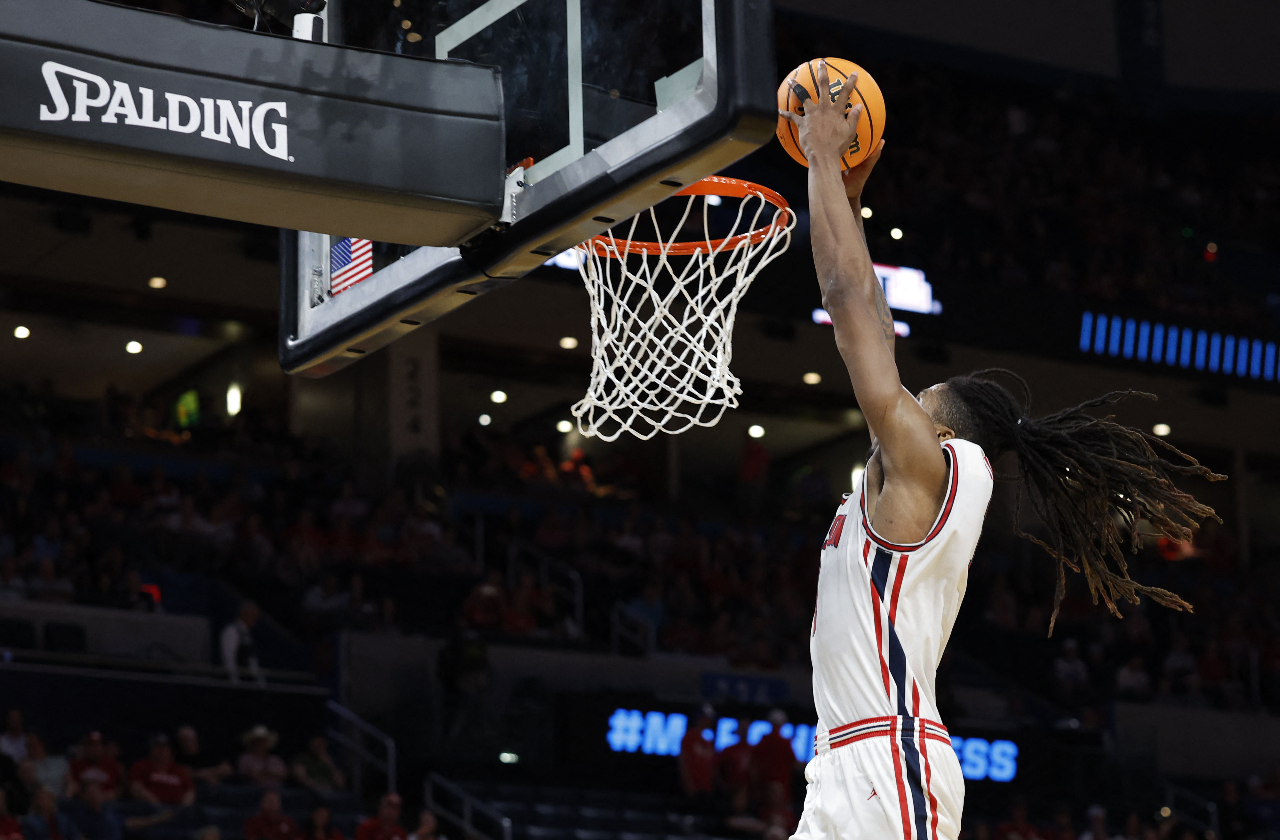 Houston Cougars forward Joseph Tugler dunks as we offer our bets Illinois vs. Houston prediction.