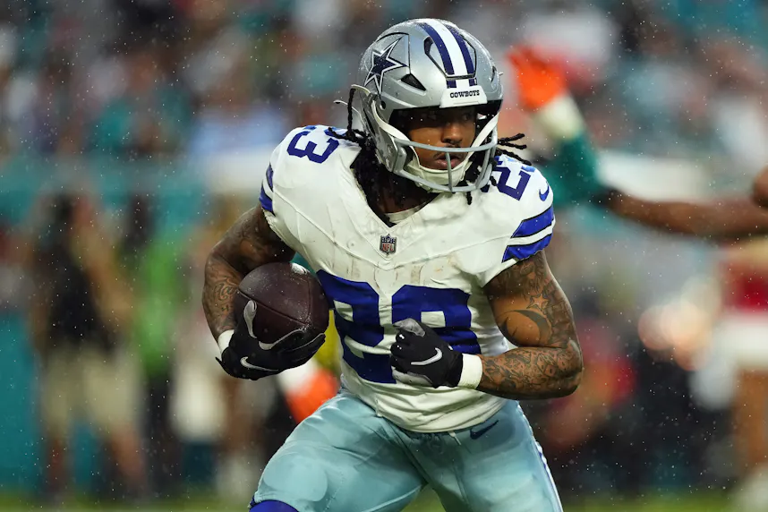 Dallas Cowboys running back Rico Dowdle rushes with the ball during the first half against the Miami Dolphins at Hard Rock Stadium as we look at our Cowboys vs. Giants TNF Parlay.