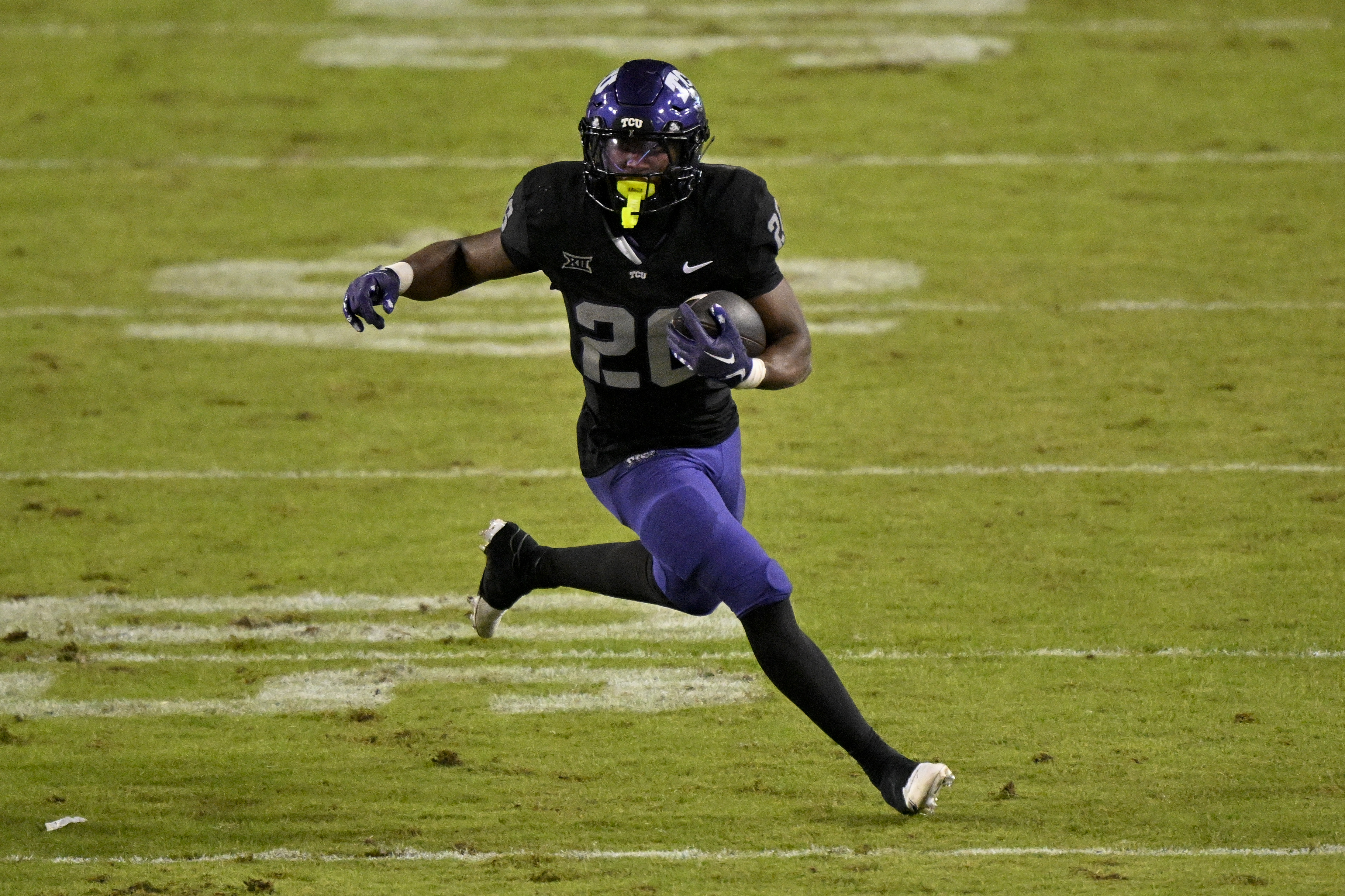 TCU Horned Frogs running back Jeremy Payne runs with the ball as we make our best North Carolina vs. TCU player prop bets.