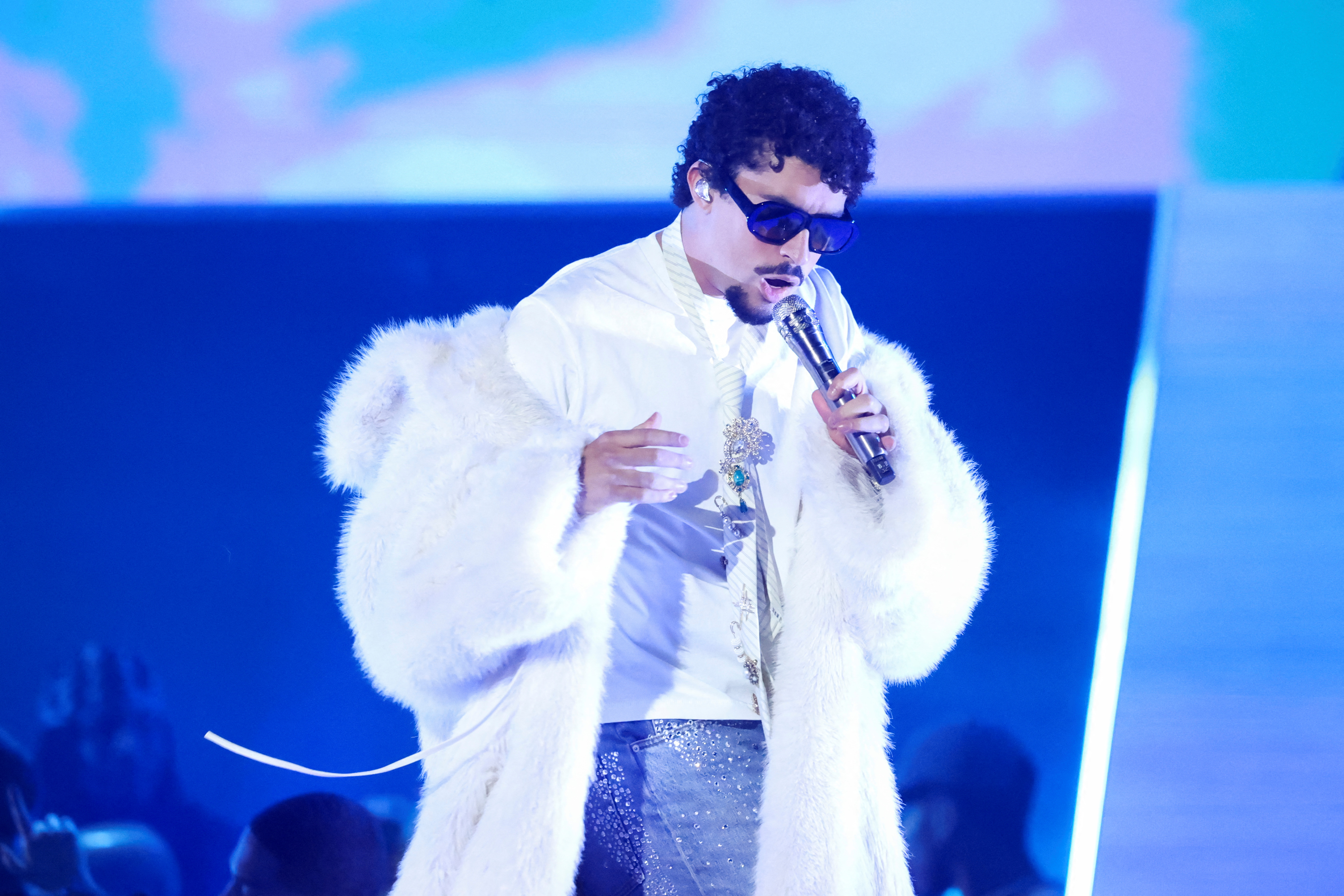 Bad Bunny performs during the iHeartRadio Music Awards, and our Super Bowl halftime show predictions believe he'll set records on Feb. 8. 